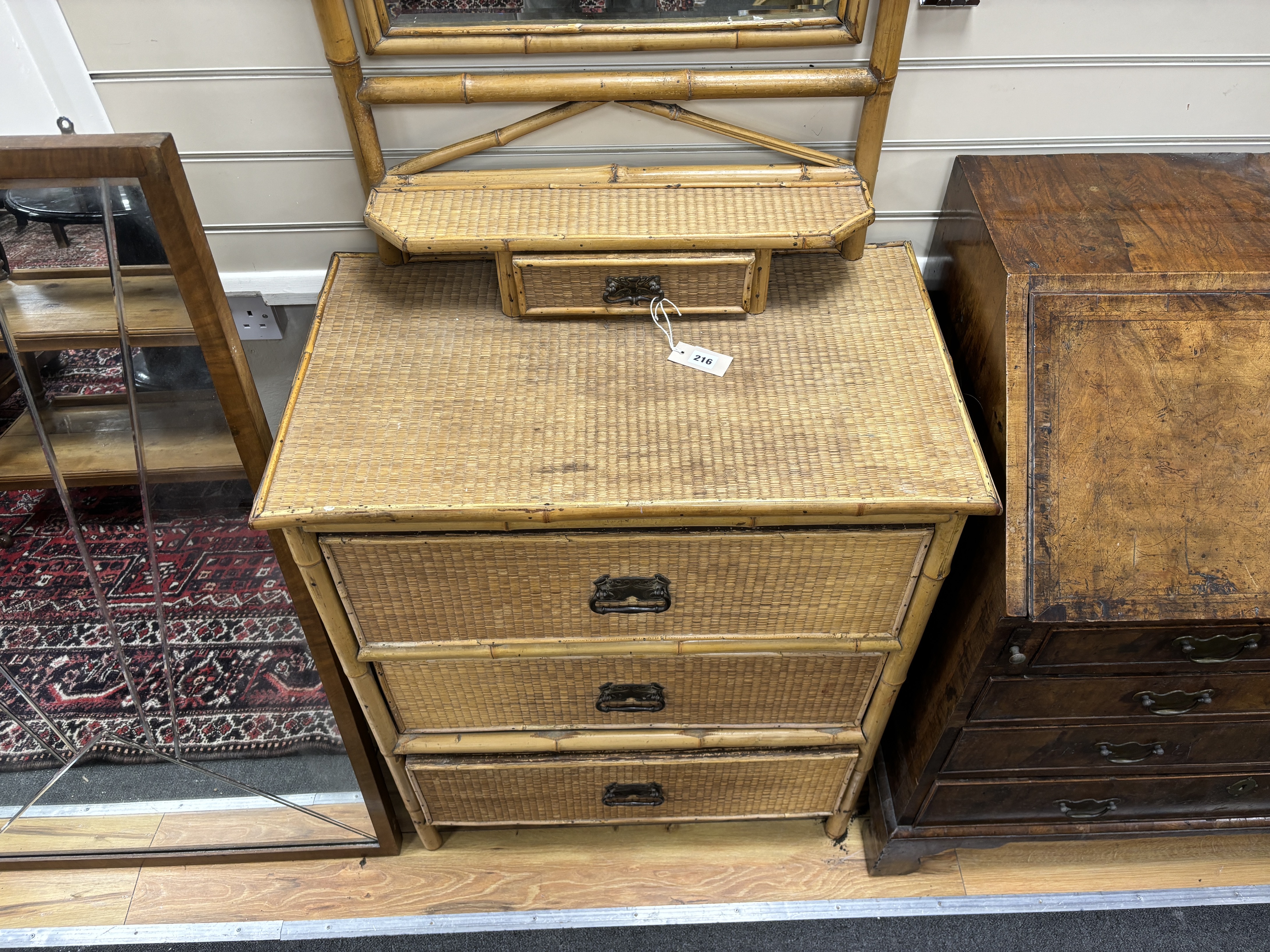 A late Victorian caned bamboo / rattan dressing chest, width 76cm, depth 55cm, height 157cm